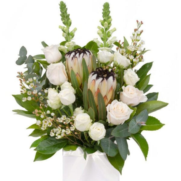 white rose & native protea arrangement