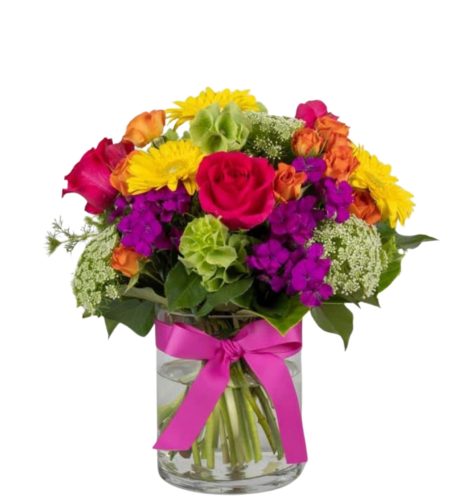 vibrant mixed blooms in glass vase
